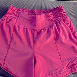 Lululemon pink shorts, size 4. Worn several times well taken care of.